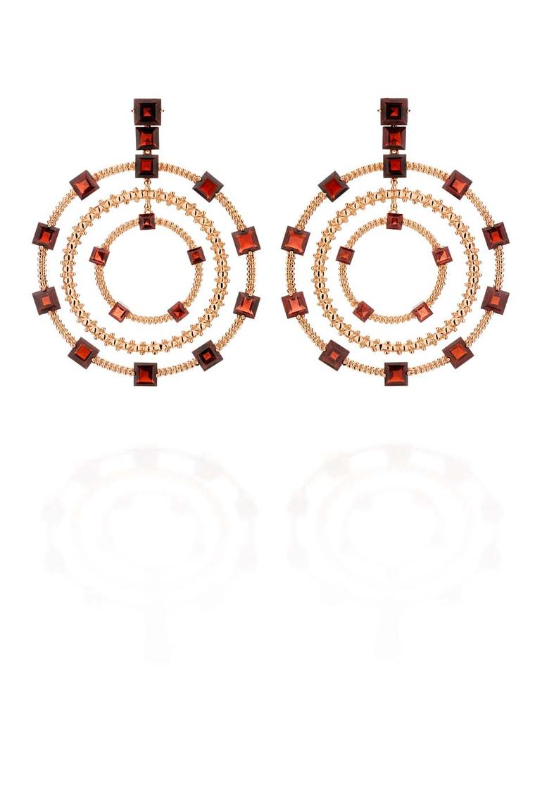 Carla Amorim hoop earrings in rose gold with square-cut red garnets, from the Sao Paulo collection.